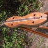 Poplar hourglass wtih cedar top and hand carved Celtic spirals on the head stock scroll